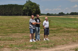 Here are the boys surveying the work. Left to right: My Dad, my brother and my grandfather.