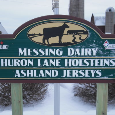 The farm sign that is near the driveway at my family's dairy farm.