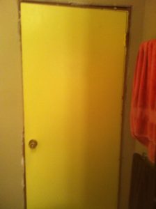 Forgive me for the poor quality, but this is the yellow door before we stripped it and stained it! 